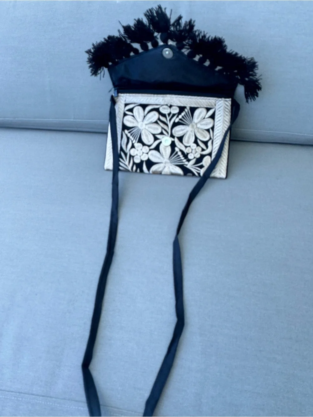 Handmade Mexican Embroidered Clutch Purse | Black & Ivory Tassel Crossbody - Picture 7 of 9